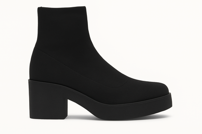 Black ankle boot on a white background